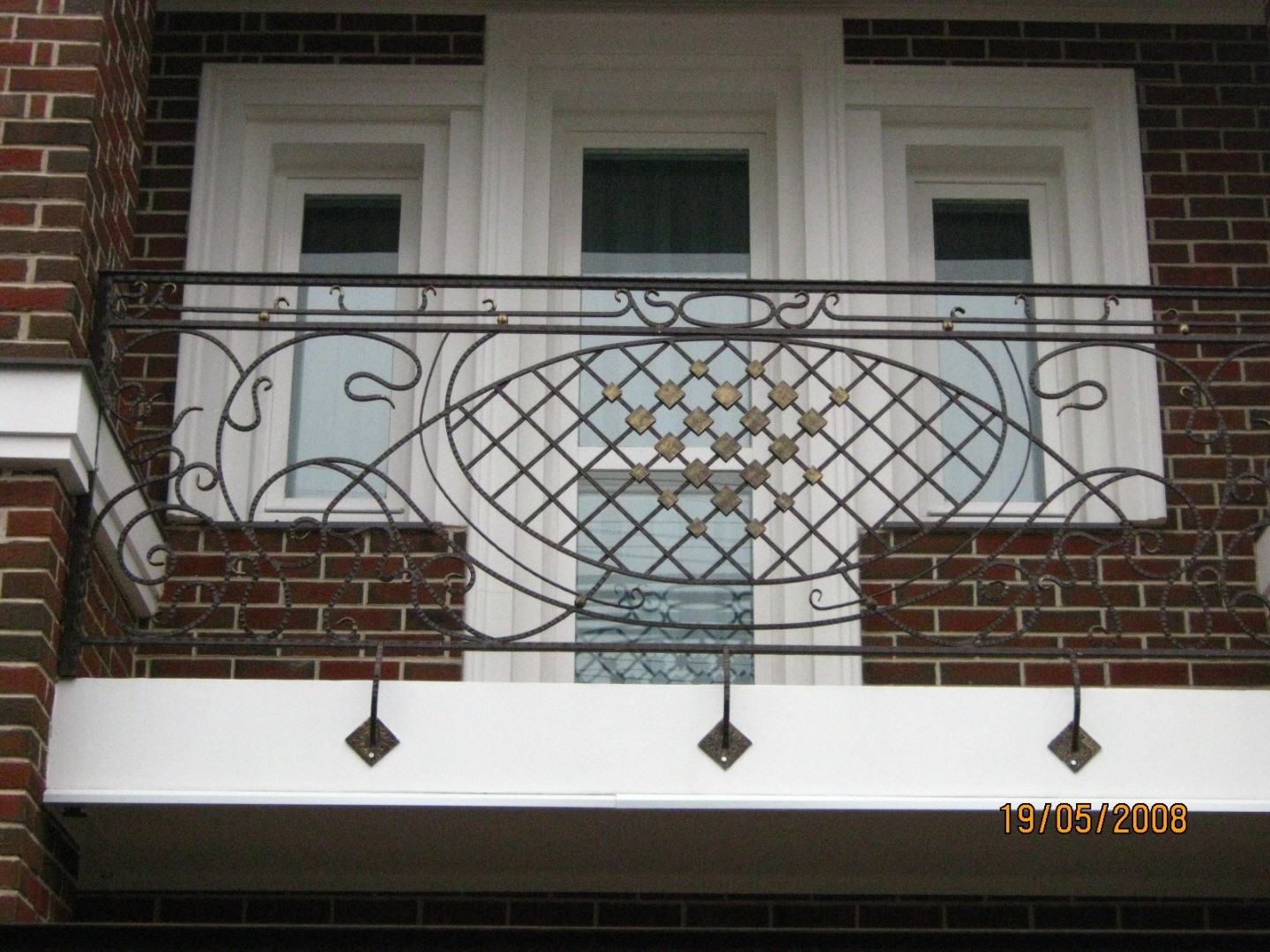 Фотография изделия - Кованое ограждение балкона в классическом стиле