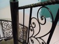 Превью изделия - Винтовая лестница с коваными перилами из секций