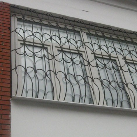 Кованая решетка на окно Лето