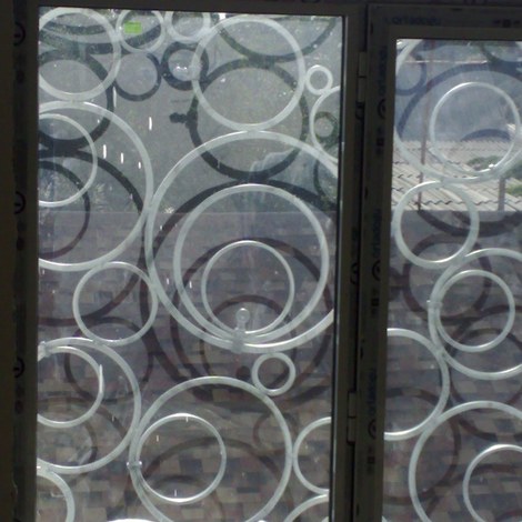Кованая решетка на окно Круги